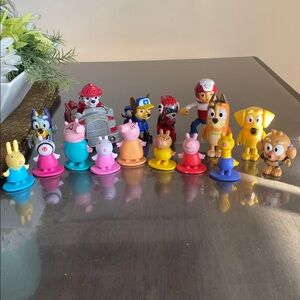 A variety Bundle of Kids Toy Figurines Bluey Peppa pig paw patrol